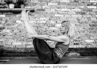 Yoga Practice Meditation And Exercise Black And White Photo Of Woman In Yoga Studio