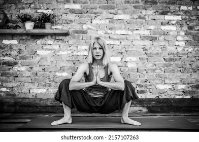 Yoga Practice Meditation And Exercise Black And White Photo Of Woman In Yoga Studio