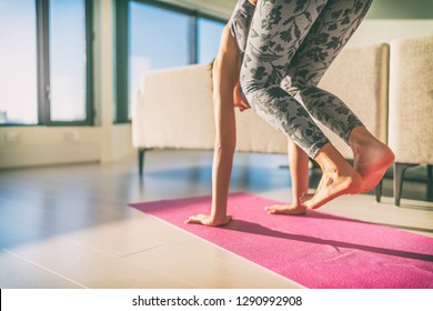 Yoga Practicing To Handstand - Beginner Girl Doing Jump Through On Hands On Exercise Mat At Home. Jumping With Legs And Feet In The Air. Core Balance Workout.