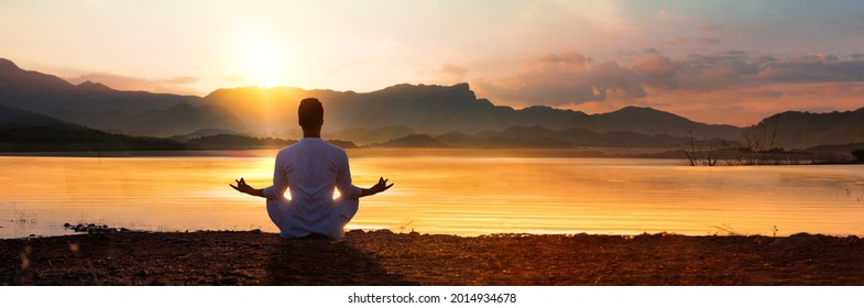 YOGA Silhouette Man Sitting Near Lake