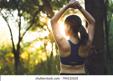 yoga in summer sunset in forest - Powered by Shutterstock