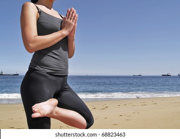 Yoga Teacher Practising At The Beach Pose Tadasana