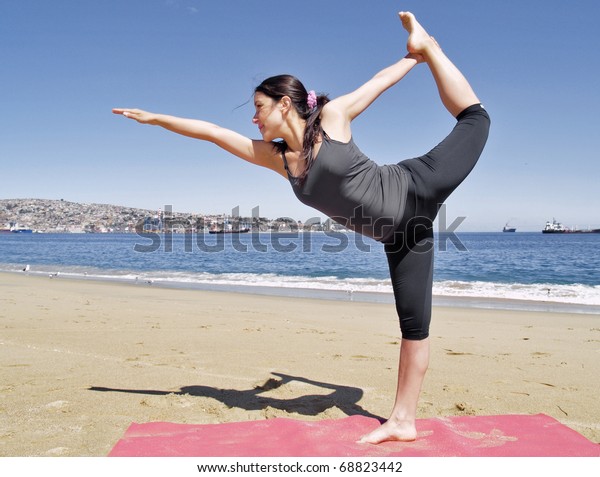 Yoga Teacher Practising Beach Pose Dandayamana Stock Photo (Edit Now ...