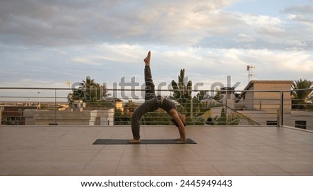 yoga at the terrace in Spain