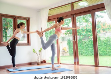 Yoga Training. Fitness Lady Beginning Yoga Practice With Yoga Trainer At Home.