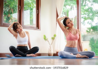 Yoga Training. Fitness Lady Beginning Yoga Practice With Yoga Trainer At Home.