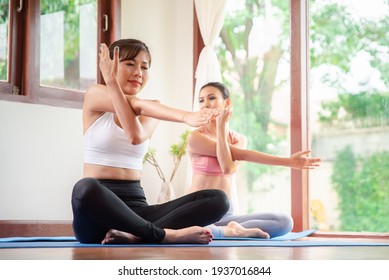 Yoga Training. Fitness Lady Beginning Yoga Practice With Yoga Trainer At Home.