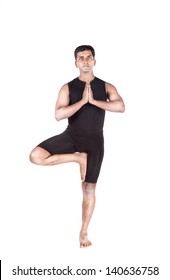 Yoga Tree Pose By Indian Man In Black Costume Mudra Isolated At White Background