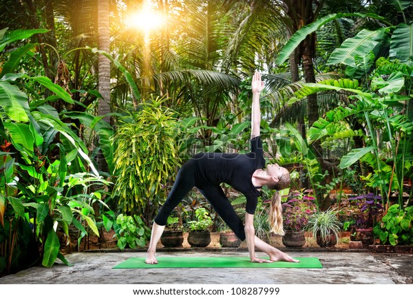 Yoga Utthita Trikonasana Triangle Pose By Stock Photo 108287999 ...