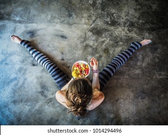 Yoga Woman With Chia Fruit Plate On The Floor In Bird View