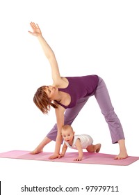 Yoga for woman and child / Mother with her baby doing Yoga exercise