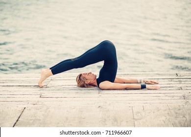 Yoga Woman. Halasana.