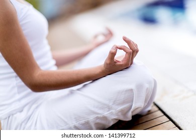 Yoga Woman Meditating And Making A Zen Symbol With Her Hand