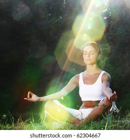 Yoga Woman On Green Grass