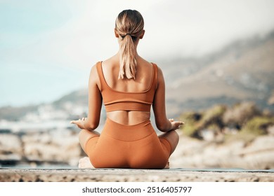 Yoga woman, outdoor meditation and mountain for peace, mindfulness or balance chakra in morning. Zen meditate, spiritual wellness and training for energy, focus or self care by mountains in Cape Town - Powered by Shutterstock