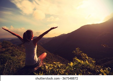Yoga Woman Practice On Mountain Peak