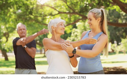 Yoga, workout and an old couple with their personal trainer in a park for a health or active lifestyle. Exercise, wellness or zen and senior people outdoor for fitness class with their pilates coach - Powered by Shutterstock