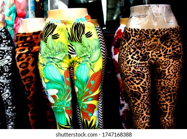 Yoga And Workout Pants Photographed On Mannequins. Yoga Pants With Vibrant And Colorful Patterns.