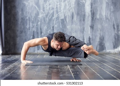 Yoga Young Man Doing Asana Ashtavakrasana Stock Photo 531302113 ...