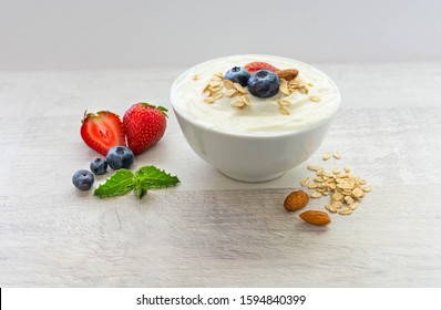 Yoghurt With Granola Strawberry Ablueberry Oat  And  Almonds