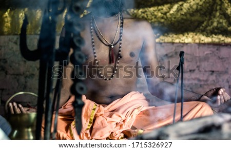 Yogi is meditating and praying