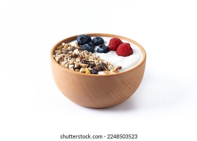 Yogurt with berries and muesli for breakfast in bowl. 