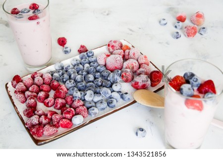 Similar – Image, Stock Photo Wild berries smoothie bowls