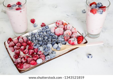 Similar – Image, Stock Photo Wild berries smoothie bowls