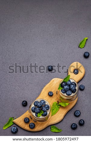 Similar – Foto Bild Glas schwarzer Chiapudding mit Wassermelonen-Geschmack