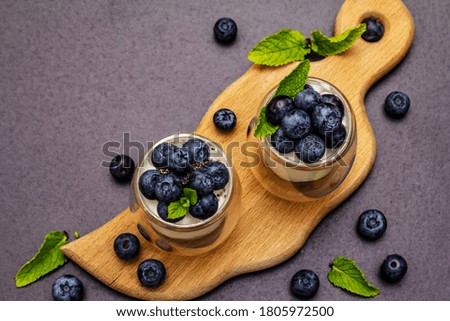 Similar – Foto Bild Glas schwarzer Chiapudding mit Wassermelonen-Geschmack