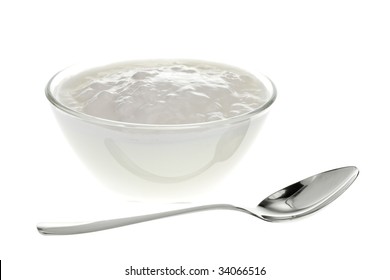 Yogurt Bowl With Spoon On White Background