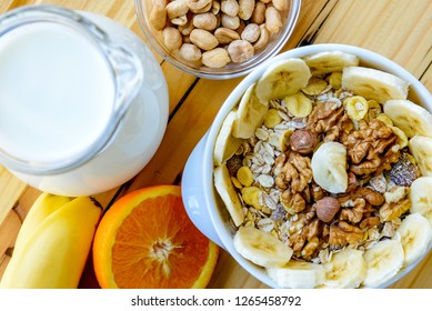 Yogurt, cereals and fresh fruit for a healthy breakfast - Shutterstock ID 1265458792