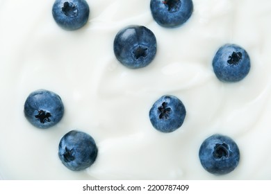 Yogurt. Close Up Yogurt Texture With Blueberry. Backgrounds. Abstract. Concept For Packaging Design. Mock Up.