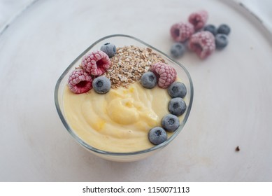 Yogurt with granola and berries - Shutterstock ID 1150071113