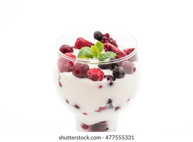 Yogurt With Mixed Berries On White Background