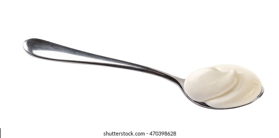 Yogurt On Spoon Isolated