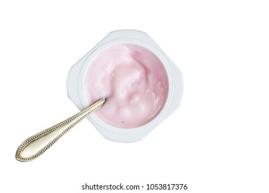 Yogurt In Plastic Cup With Silver Spoon Isolated On White Background