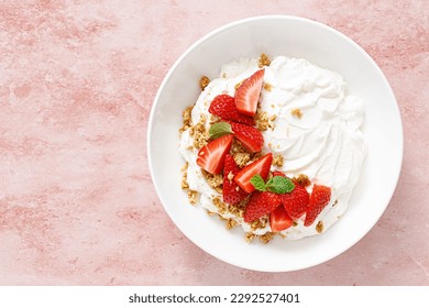 Yogurt with strawberry. Plain white greek yogurt with fresh berries and granola. Healthy food, breakfast. Top view - Powered by Shutterstock