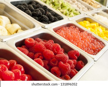 Ã?Â¢??Frozen Yogurt Toppings Bar. Yogurt Toppings Ranging From Fresh Fruits, Nuts, Fresh-cut Candies, Syrups And Sprinkles.