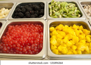 Ã?Â¢??Frozen Yogurt Toppings Bar. Yogurt Toppings Ranging From Fresh Fruits, Nuts, Fresh-cut Candies, Syrups And Sprinkles.