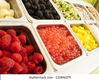 Ã?Â¢??Frozen Yogurt Toppings Bar. Yogurt Toppings Ranging From Fresh Fruits, Nuts, Fresh-cut Candies, Syrups And Sprinkles.