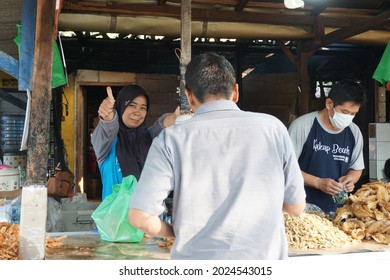 Yogyakarta, Central Java, Indonesia - June 1st, 2021 : The People Buy Wader Goreng (fried Fish) In Warung