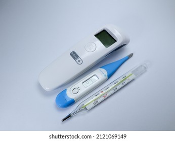 Yogyakarta - December 12 2021: various kinds of thermometer from glass thermometer to digital thermometer isolated on white background