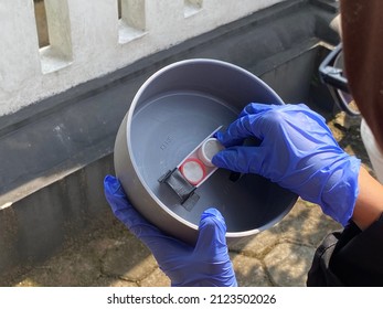 Yogyakarta, Indonesia - 02 10 2022: Health Analyst Holding Ambient Air Sample