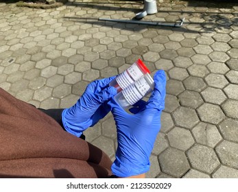 Yogyakarta, Indonesia - 02 10 2022: Health Analyst Holding Ambient Air Sample