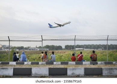 Yogyakarta, Indonesia. 16-10-2019 : Some People Are Watching The Plane Which Taking Off At Adisutjipto Airports.