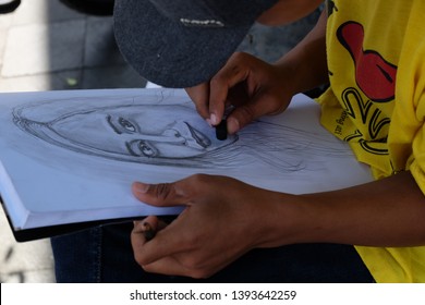 Yogyakarta Indonesia 19 August 2016 Street Caricature Artist Sketching At Malioboro