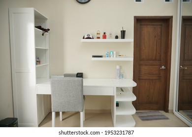 Yogyakarta, Indonesia - April 9 2021: Minimalist Bedroom With White Working Desk And Cabinet From Several Angle.