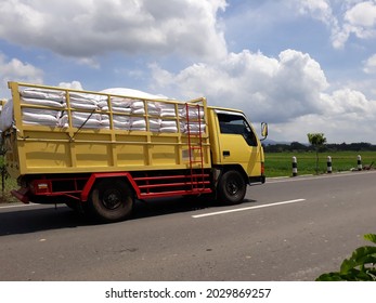Yogyakarta, Indonesia, August 24, 2021. Trucks down the road