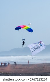 Yogyakarta/ Indonesia - August 25th 2019 : Sky Diver Performing Sky Dive Hanging Wonderful Indonesia Flag In Jogja Air Show 2019